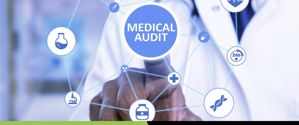 male doctor selecting medical audit option