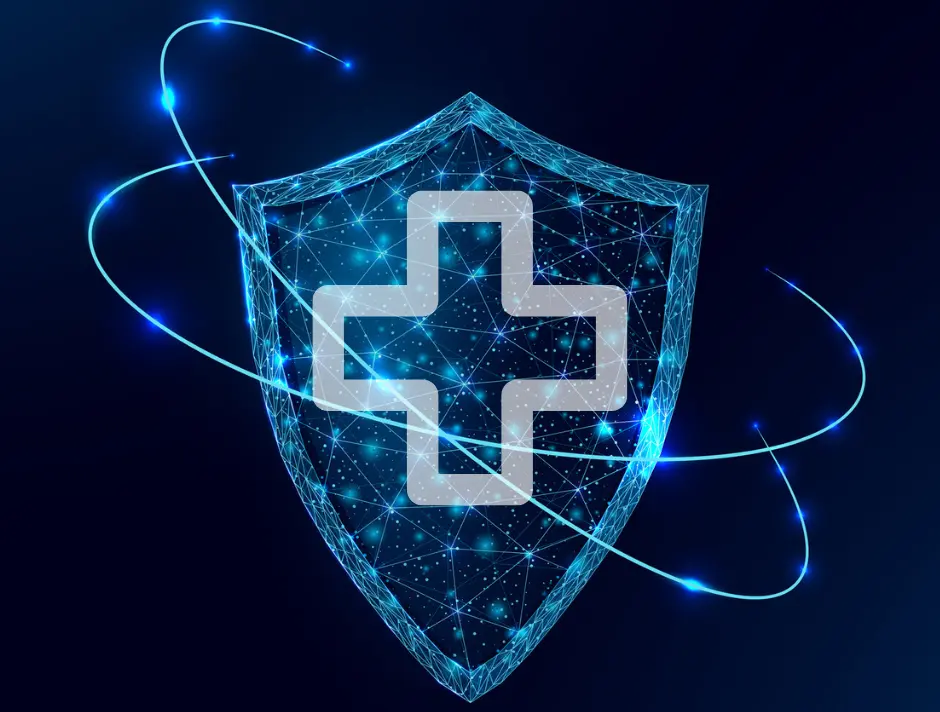 A blue shield with a white cross demonstrate cybersecurity for healthcare data.